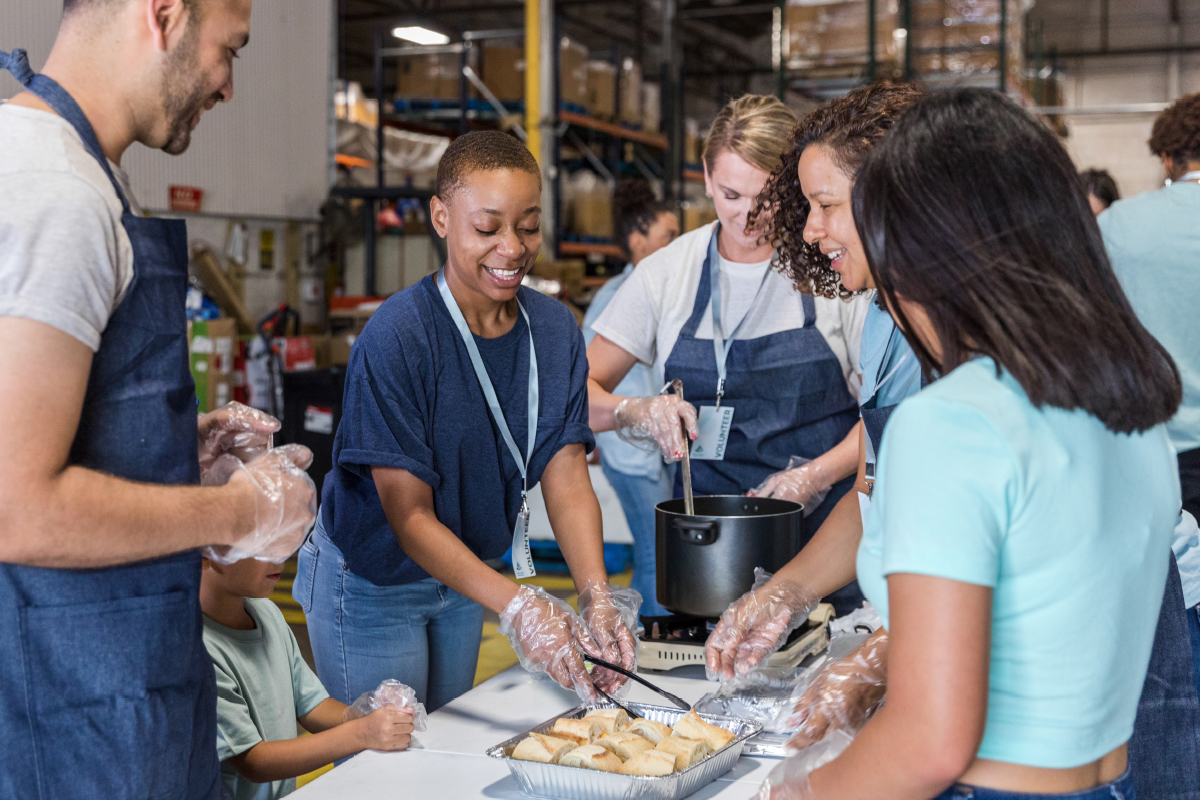 group of volunteers preparing food